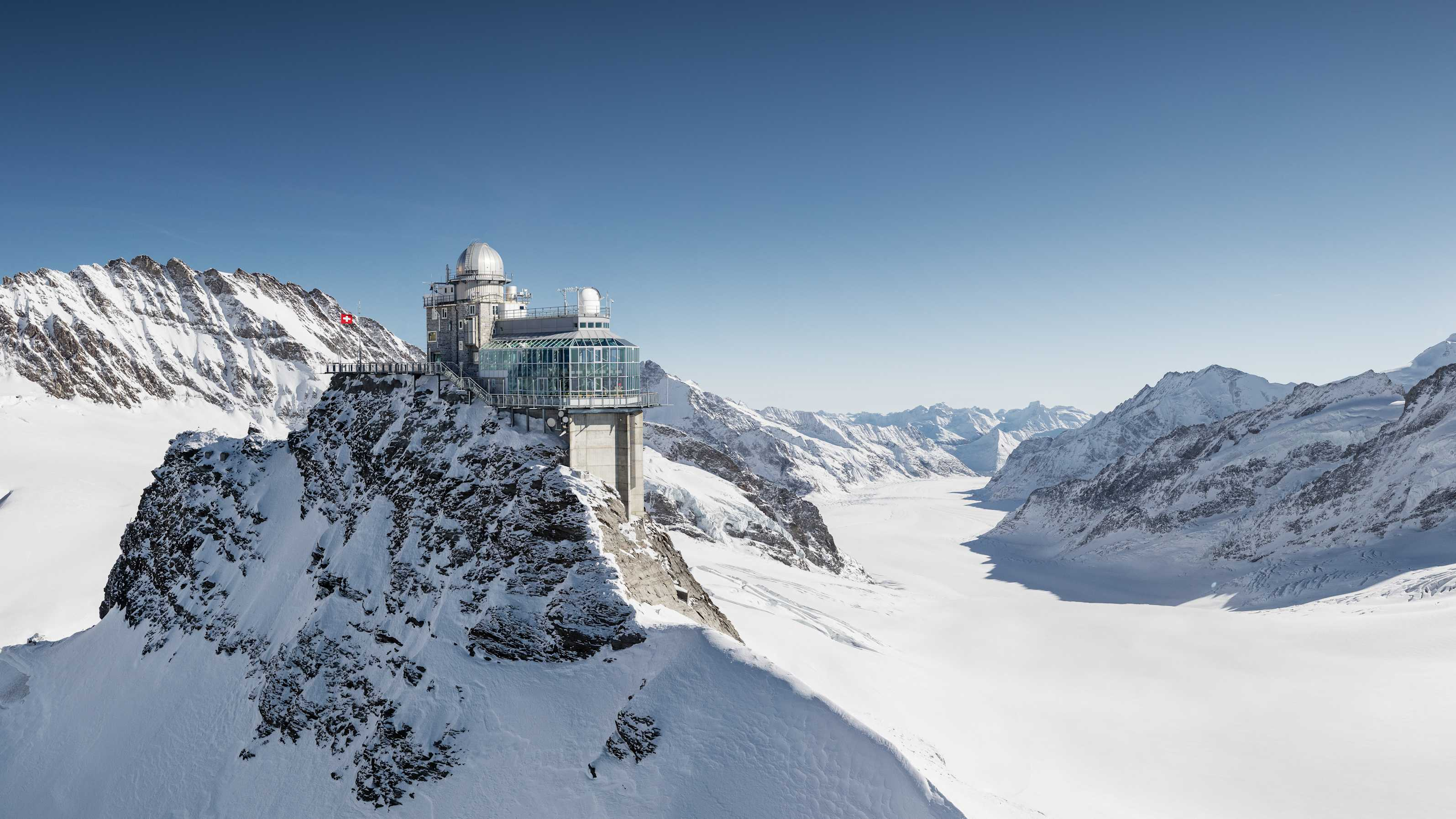 Jungfraujoch snowy summit, elite Swiss Alps experience with comforttransfer